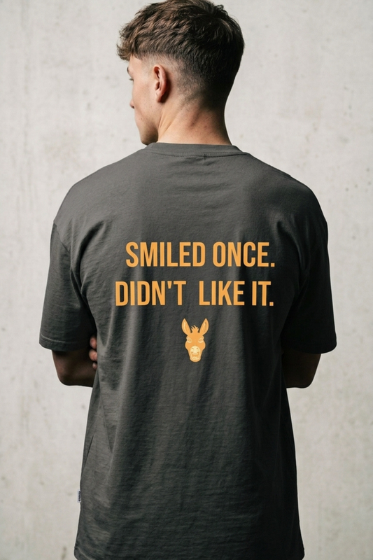 Smiled Once. Didn't Like It. — Asphalt Graphic Tee | Men's Streetwear | Stay Stubborn STBN